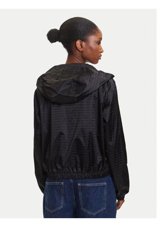 Tommy Jeans Wiatrówka Jacquard DW0DW20952 Czarny Relaxed Fit. Kolor: czarny. Materiał: syntetyk