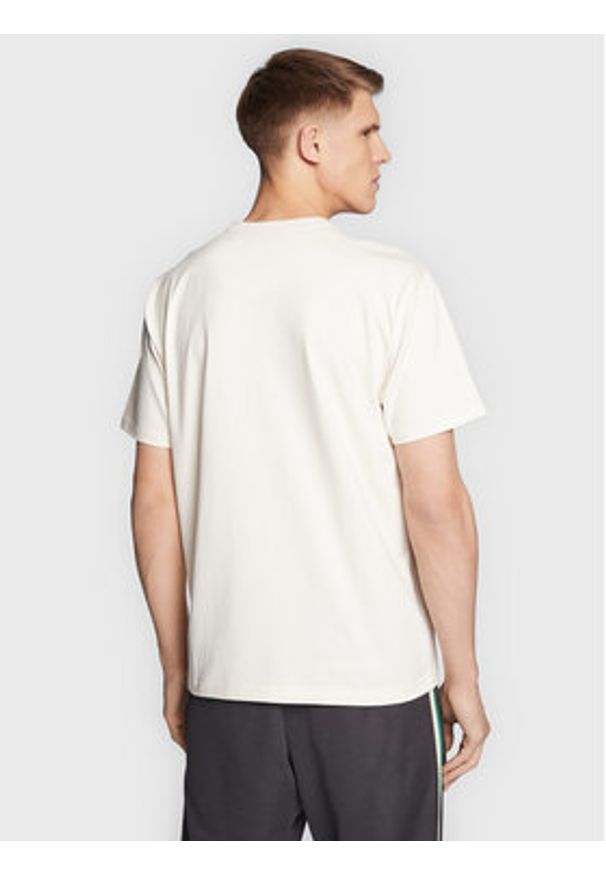 New Balance T-Shirt MT23567 Écru Relaxed Fit. Kolor: kremowy. Materiał: bawełna