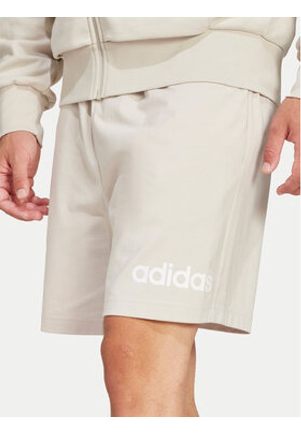 Adidas - adidas Szorty sportowe Essentials Linear JC9346 Beżowy Regular Fit. Kolor: beżowy. Materiał: bawełna. Styl: sportowy