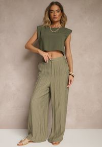 Renee - Ciemnozielone Spodnie o Szerokim Kroju High Waist Natoreia. Okazja: na co dzień. Stan: podwyższony. Kolor: zielony. Styl: klasyczny, casual, boho, elegancki