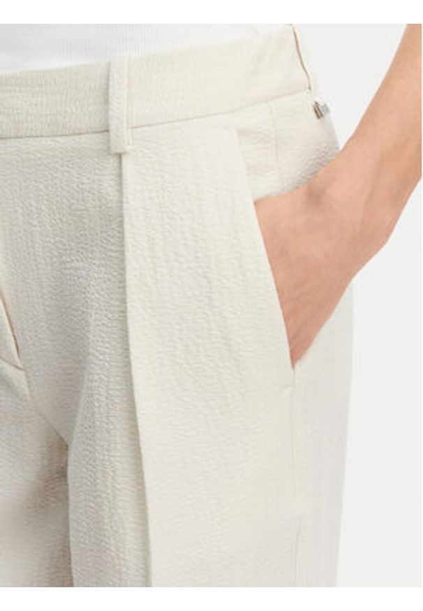 Calvin Klein Spodnie palazzo K20K208217 Beżowy Wide Leg. Kolor: beżowy. Materiał: syntetyk