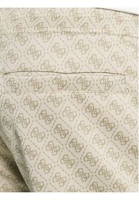 Guess Spodnie dresowe Z5BB19 K2042 Beżowy Regular Fit. Kolor: beżowy. Materiał: syntetyk