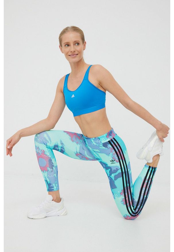 adidas Originals legginsy damskie kolor turkusowy z nadrukiem. Kolor: turkusowy. Materiał: dzianina, materiał. Wzór: nadruk