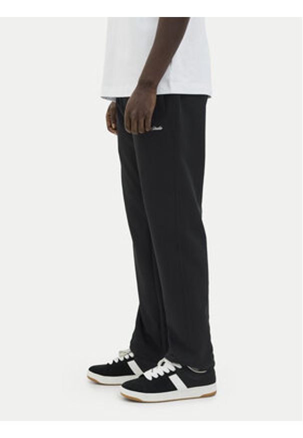 Jack & Jones - Jack&Jones Spodnie dresowe Kane Norrebro 12282553 Czarny Relaxed Fit. Kolor: czarny. Materiał: bawełna