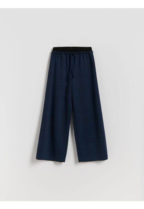Reserved - Luźne spodnie w kratę - wielobarwny. Materiał: wiskoza, dzianina