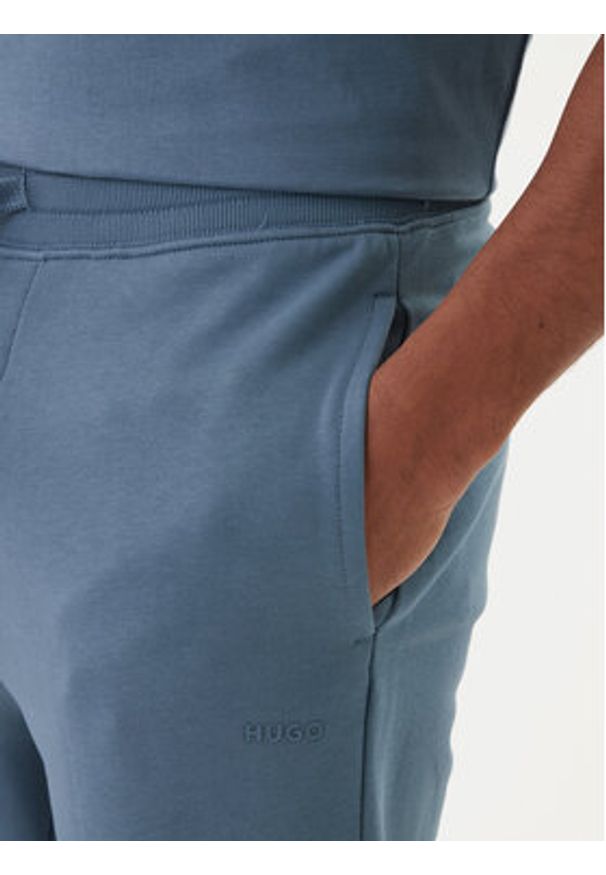 Hugo - HUGO Spodnie dresowe Dayote232 50489617 Niebieski Regular Fit. Kolor: niebieski. Materiał: bawełna