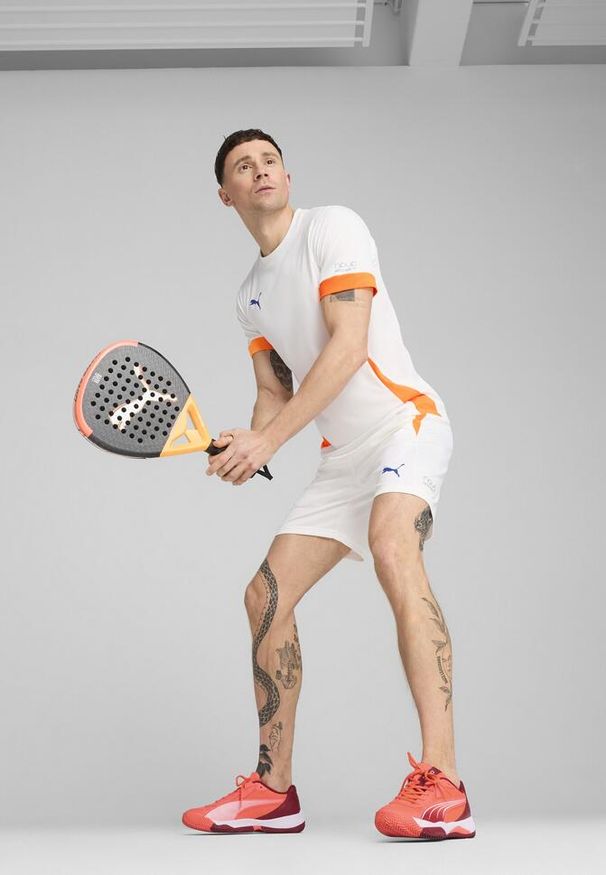Puma - Męskie szorty treningowe do padla INDIVIDUAL PUMA. Kolor: wielokolorowy, pomarańczowy, żółty, biały, niebieski