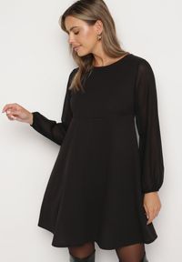 Born2be - Czarna Sukienka o Rozkloszowanym Kroju z Półtransparentnymi Rękawami Edalinne. Okazja: na co dzień, do pracy. Kolor: czarny. Materiał: skóra. Typ sukienki: proste. Styl: casual, elegancki #4