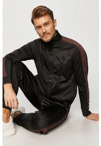 Trussardi Jeans - Spodnie. Kolor: czarny. Materiał: bawełna, dzianina, elastan. Wzór: aplikacja #4