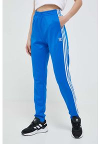 adidas Originals spodnie dresowe kolor niebieski z aplikacją. Kolor: niebieski. Materiał: dresówka. Wzór: aplikacja #1