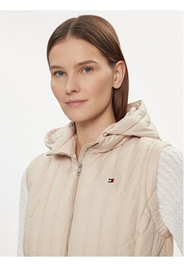 TOMMY HILFIGER - Tommy Hilfiger Bezrękawnik Feminine Lw Down Vest WW0WW40485 Beżowy Slim Fit. Kolor: beżowy. Materiał: syntetyk. Długość rękawa: bez rękawów