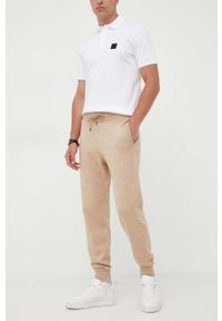 BOSS spodnie dresowe z domieszką wełny kolor beżowy melanżowe. Kolor: beżowy. Materiał: wełna, dresówka. Wzór: melanż #1