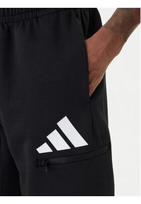 Adidas - adidas Spodnie dresowe Future Icons 3 Bar JZ9399 Czarny Regular Fit. Kolor: czarny. Materiał: syntetyk #4