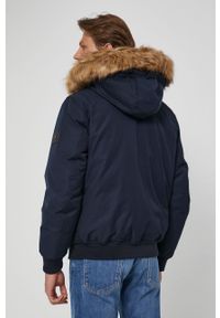 TOMMY HILFIGER - Tommy Hilfiger Kurtka puchowa męska kolor granatowy zimowa. Kolor: niebieski. Materiał: puch. Sezon: zima #3
