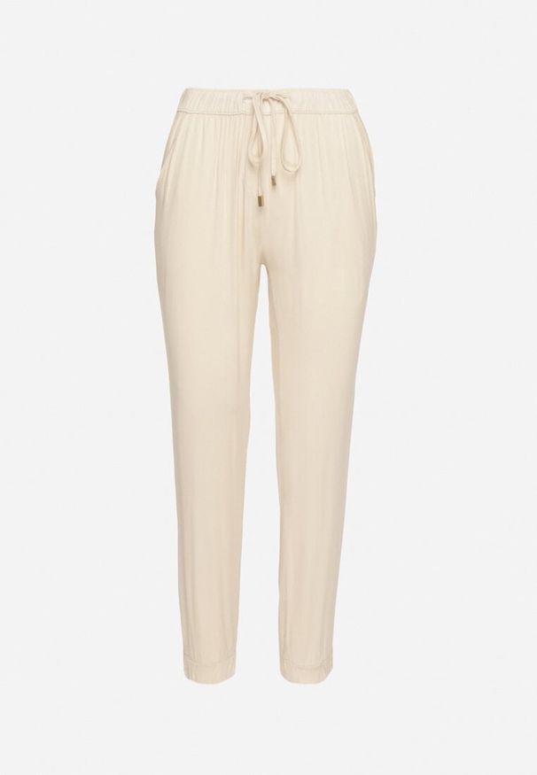 Born2be - Jasnobeżowe Spodnie Dresowe z Wysokim Stanem i Wiązaniem Elliene. Okazja: na co dzień. Stan: podwyższony. Kolor: beżowy. Materiał: dresówka. Styl: casual
