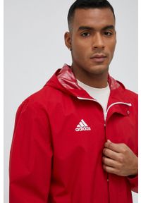 adidas Performance wiatrówka Entrada 22 kolor czerwony przejściowa. Kolor: czerwony. Materiał: materiał #3