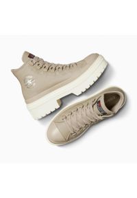 Adidasy Converse Chuck Taylor All Star Lugged Heel, Kobiety. Kolor: beżowy. Materiał: skóra ekologiczna, materiał. Obcas: na platformie. Model: Converse All Star. Sport: fitness