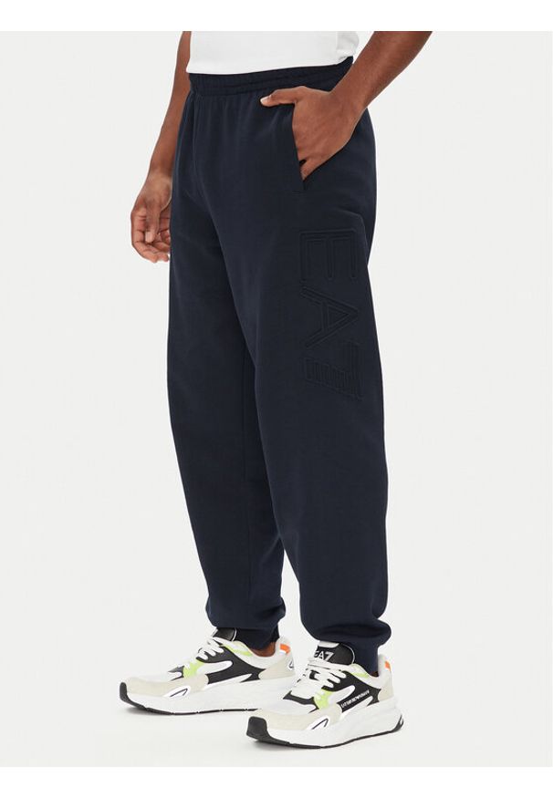 EA7 Emporio Armani Spodnie dresowe 7M000154 AF10432 UB102 Granatowy Regular Fit. Kolor: niebieski. Materiał: bawełna