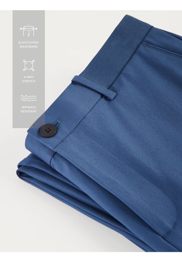 Reserved - Spodnie chino slim fit - niebieski. Kolor: niebieski. Materiał: tkanina, wiskoza