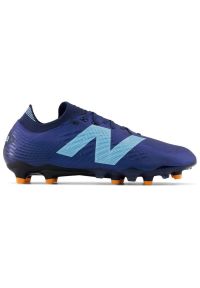 Buty piłkarskie New Balance Tekela V4+ Pro Low M ST1FLN45 niebieskie. Zapięcie: sznurówki. Kolor: niebieski. Materiał: guma, syntetyk, tkanina. Sport: piłka nożna