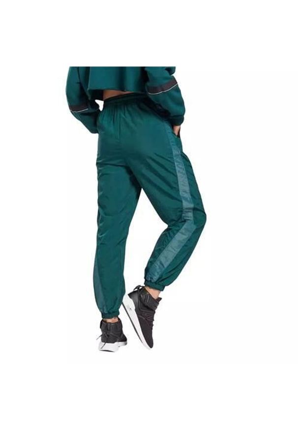 Spodnie sportowe damskie Reebok Shiny Woven Xs. Kolor: zielony