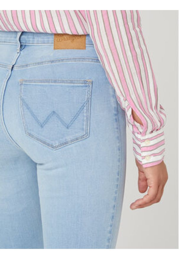 Wrangler Jeansy W26LCY37L 112332358 Błękitny Slim Fit. Kolor: niebieski