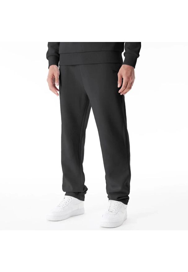 Spodnie do biegania New Era. Kolor: czarny. Materiał: dresówka. Długość: długie. Wzór: haft