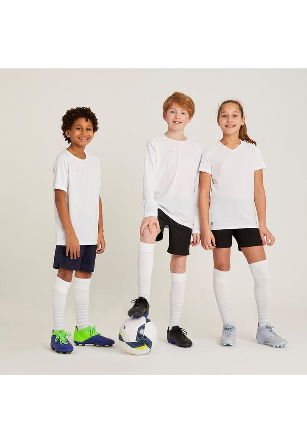 KIPSTA - Koszulka do piłki nożnej dla dziewczynek Kipsta Viralto. Kolor: biały. Materiał: poliester, materiał, tkanina. Sport: piłka nożna