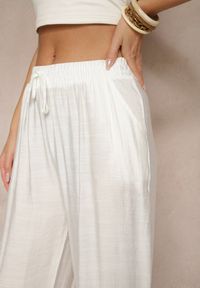 Renee - Jasnobeżowe Spodnie z Wiskozy High Waist o Szerokim Kroju Divlise. Okazja: na co dzień. Stan: podwyższony. Kolor: beżowy. Materiał: wiskoza. Styl: elegancki, casual #5