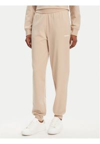 Hugo - HUGO Spodnie dresowe 50490578 Beżowy Regular Fit. Kolor: beżowy. Materiał: bawełna