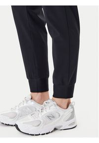 Under Armour Spodnie dresowe Armoursport High Rise Wvn Pnt 1382727-001 Czarny Loose Fit. Kolor: czarny. Materiał: syntetyk #4