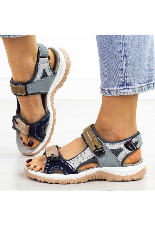 Granatowe 1 skórzane sandały damskie T.Sokolski 665. Okazja: na spacer, na co dzień. Zapięcie: rzepy. Kolor: niebieski. Materiał: skóra. Sezon: wiosna, lato. Styl: casual, klasyczny, sportowy