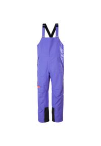 Damski kombinezon narciarski Helly Hansen Emiko Shell Bib. Kolor: fioletowy. Sezon: zima. Sport: narciarstwo #1