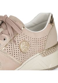 Buty damskie sportowe na koturnie ażurowe beżowe Rieker N4346-60 beżowy. Kolor: beżowy. Wzór: ażurowy. Obcas: na koturnie #6