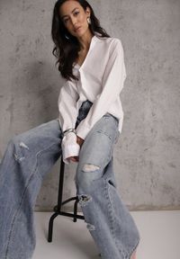 Renee - Niebieskie Szerokie Jeansy Palazzo z Bawełny z Dziurami i Przetarciami Erilenna. Okazja: na co dzień. Stan: podwyższony. Kolor: niebieski. Styl: casual, elegancki #1