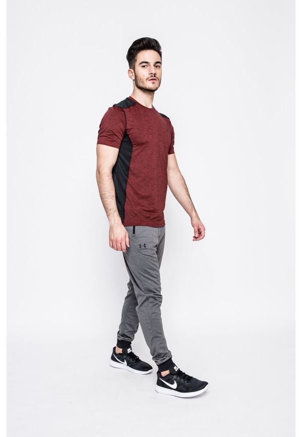Under Armour - Spodnie Sportstle. Kolor: szary. Materiał: dzianina. Wzór: gładki