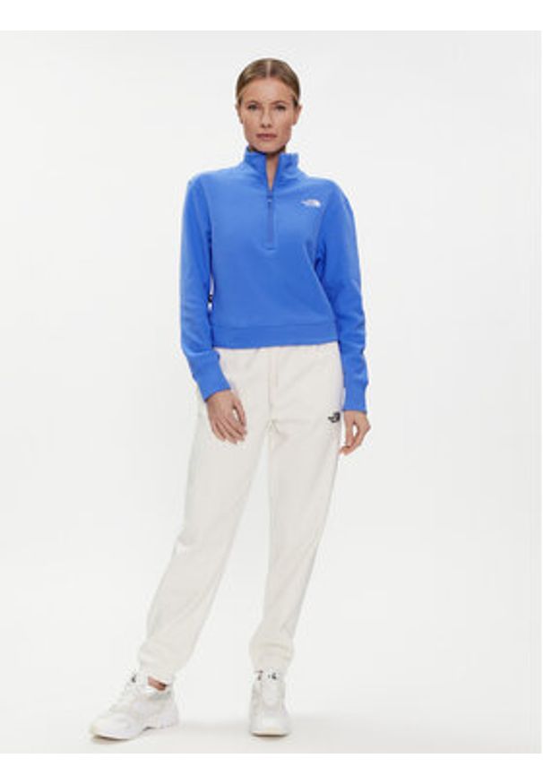 The North Face Spodnie dresowe Essential NF0A7ZJF Écru Relaxed Fit. Materiał: bawełna, syntetyk