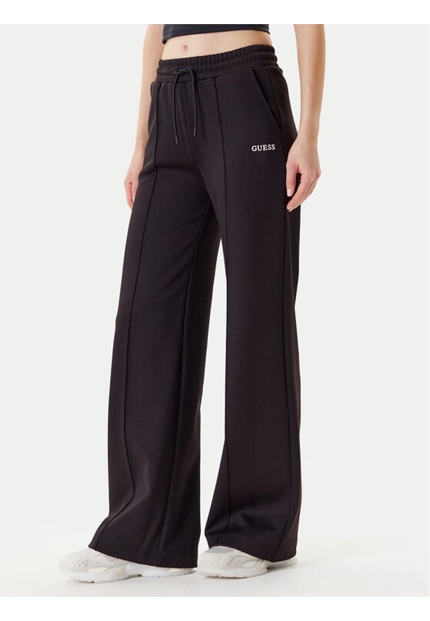 Guess Spodnie dresowe V5YB03 KCX22 Czarny Regular Fit. Kolor: czarny. Materiał: syntetyk
