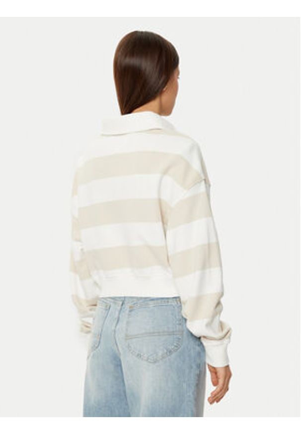 Tommy Jeans Bluza DW0DW19409 Beżowy Relaxed Fit. Kolor: beżowy. Materiał: bawełna