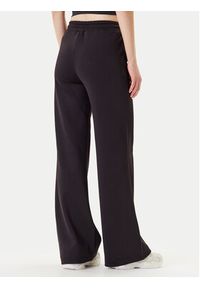 Guess Spodnie dresowe V5YB03 KCX22 Czarny Regular Fit. Kolor: czarny. Materiał: syntetyk #5