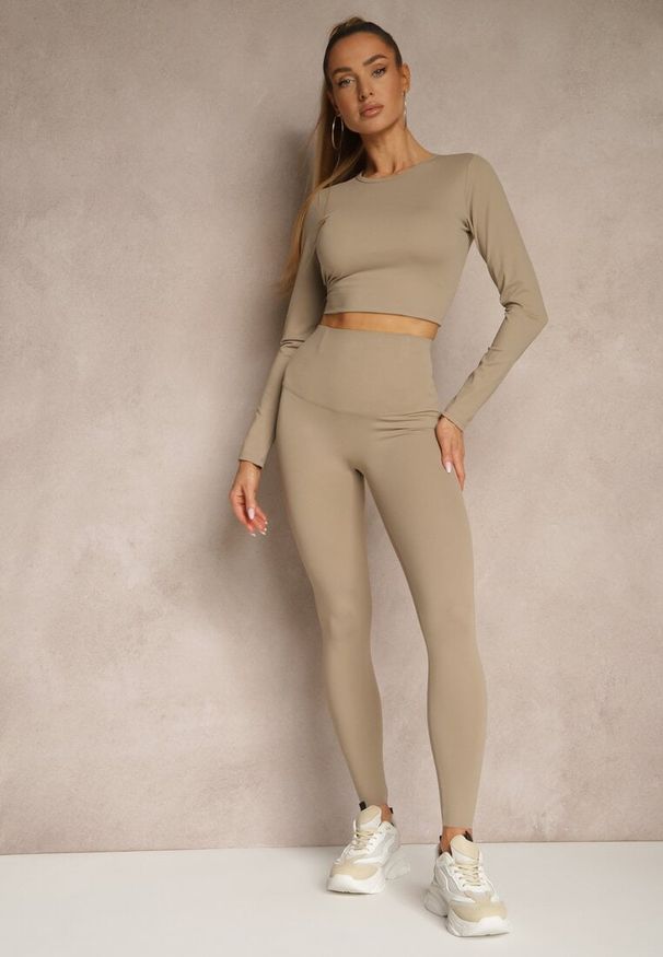 Renee - Beżowy Komplet Sportowy Legginsy i Top Typu Longsleeve Dorotia. Kolor: beżowy. Materiał: skóra