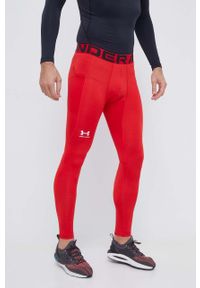 Under Armour legginsy treningowe kolor czerwony gładkie. Kolor: czerwony. Materiał: skóra, materiał. Wzór: gładki #3