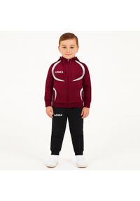 LEGEA - Komplet dresowy dla chłopca TUNISIA JR. Okazja: na uczelnię. Kolor: czerwony, wielokolorowy, brązowy, biały. Materiał: dresówka. Długość: długie. Styl: sportowy #1