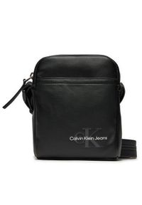 Calvin Klein Jeans Saszetka Monogram Soft K50K512032 Czarny. Kolor: czarny. Materiał: skóra