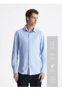 Reserved - Koszula slim fit z bawełną - jasnoniebieski. Kolor: niebieski. Materiał: bawełna #1