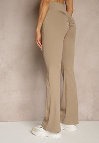Renee - Beżowe Legginsy Dzwony High Waist Orruvana. Stan: podwyższony. Kolor: beżowy. Materiał: tkanina #5