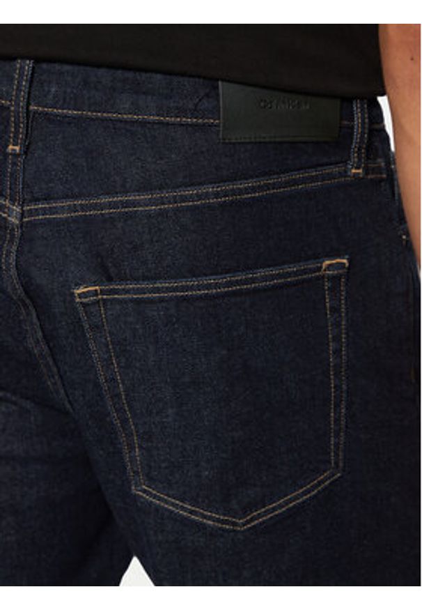 Calvin Klein Jeansy K10K113983 Granatowy Tapered Fit. Kolor: niebieski