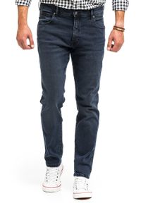 Wrangler - WRANGLER TEXAS TAPER MĘSKIE SPODNIE JEANSOWE BRUISED RIVER W12TLT364 112141166. Długość: długie. Wzór: aplikacja. Styl: klasyczny, elegancki #7