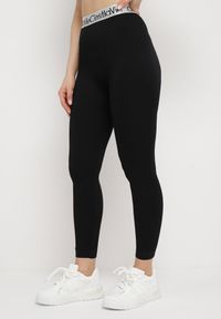 Born2be - Czarne Elastyczne Legginsy z Szeroką Gumą w Pasie Rindama. Kolor: czarny. Materiał: guma. Styl: sportowy #4