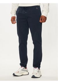 Tommy Jeans Joggery Austin DM0DM20456 Granatowy Slim Fit. Kolor: niebieski. Materiał: bawełna #1